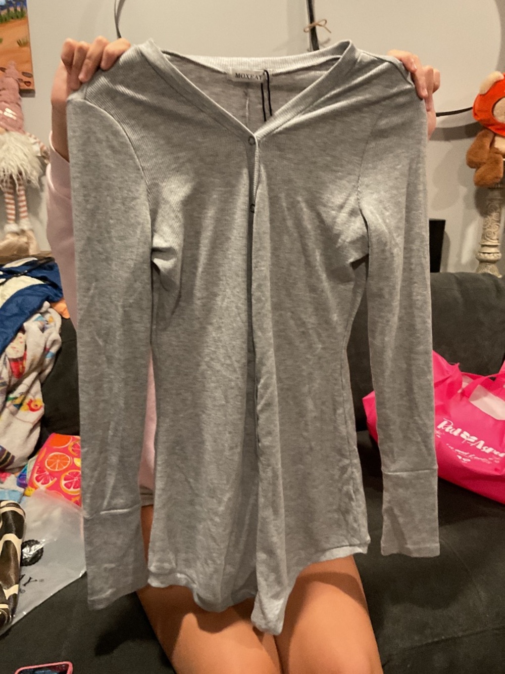 Moxeay brand, gray ribbed, long sleeve bodysuit features V-neck with snap button
